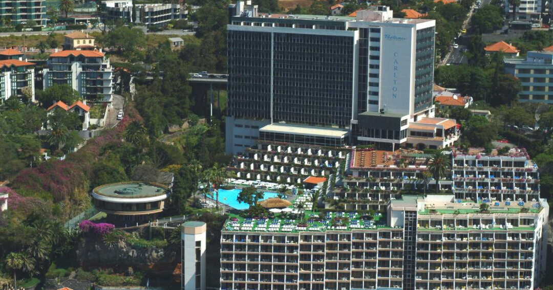 Madeira Island Hotels: A waterfront resort offering a mix of comfort and convenience with top-tier restaurants, multiple pools, direct ocean access, and a luxurious spa.