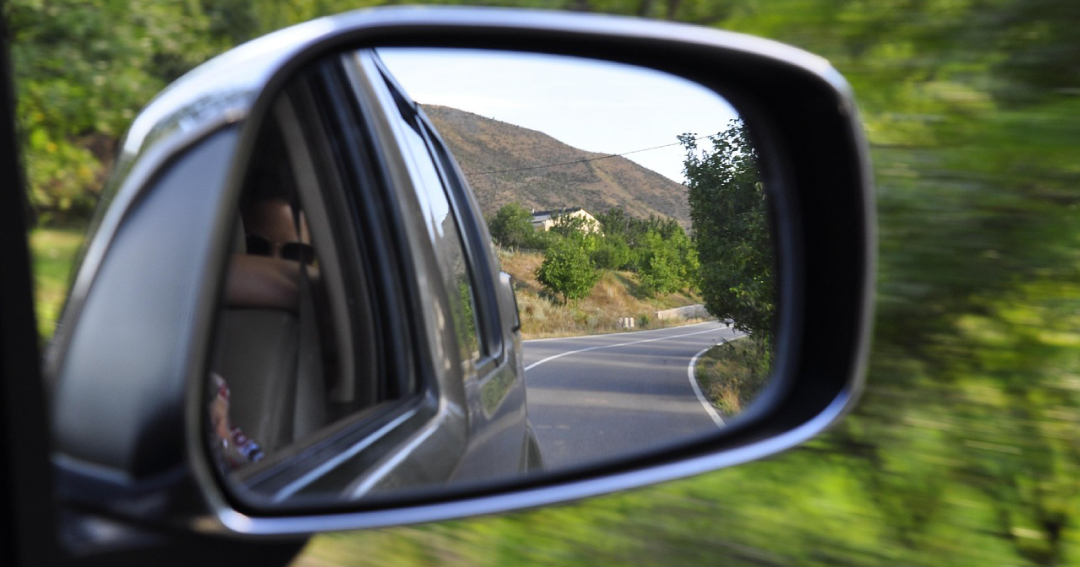 How long does it take to drive around Madeira? (Car Mirror Image)